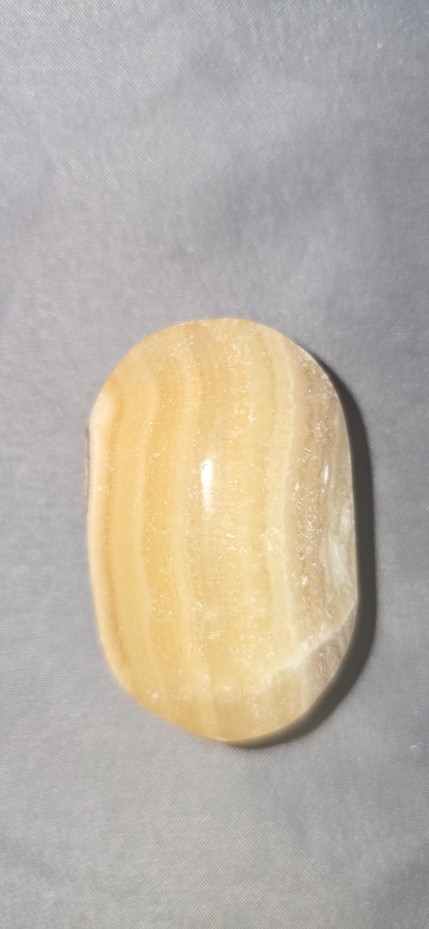 Honey Calcite Palm Stone